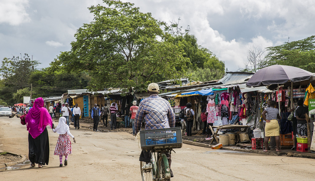 Busy Nairobi street market with small-scale traders reflecting Kenya's informal trade sector