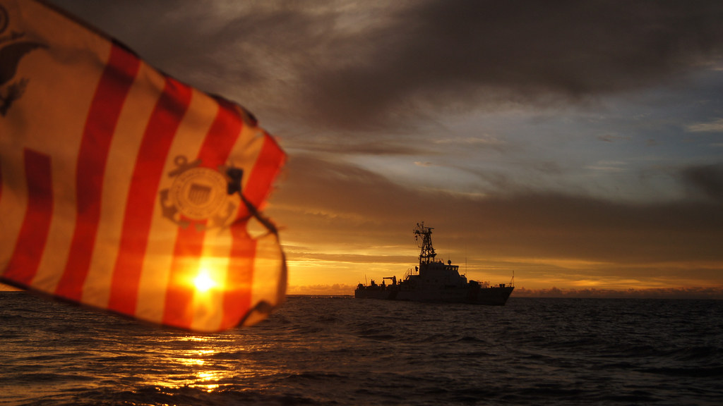 Rescue team conducting water search and rescue boat training exercise