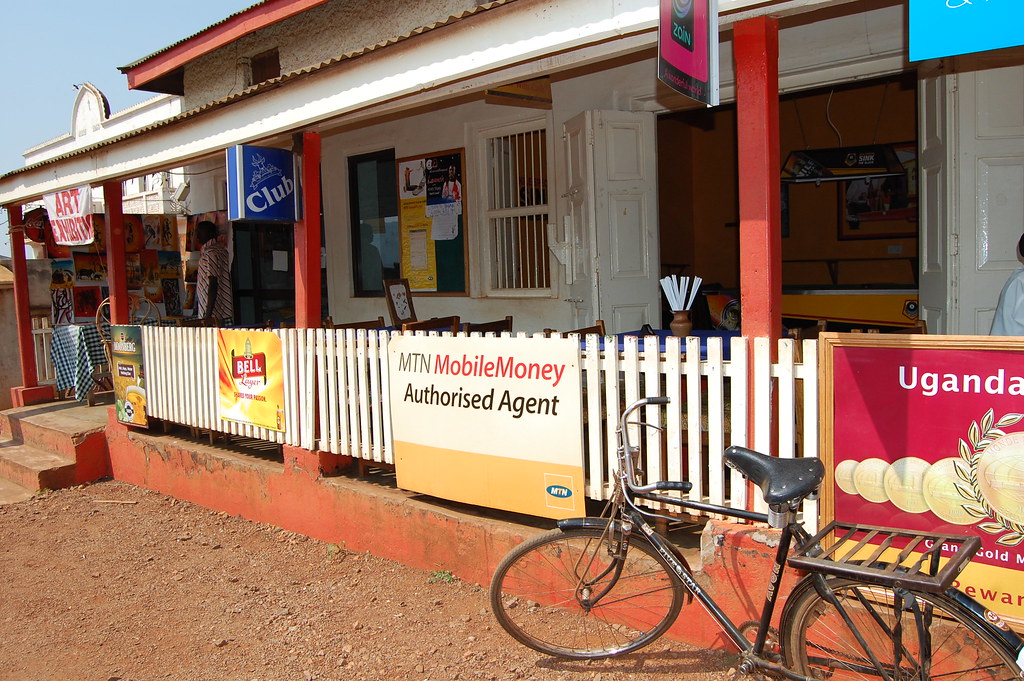 Roadside mobile money agent shopfront in East Africa, the kind of channel used for GivingTuesday donations