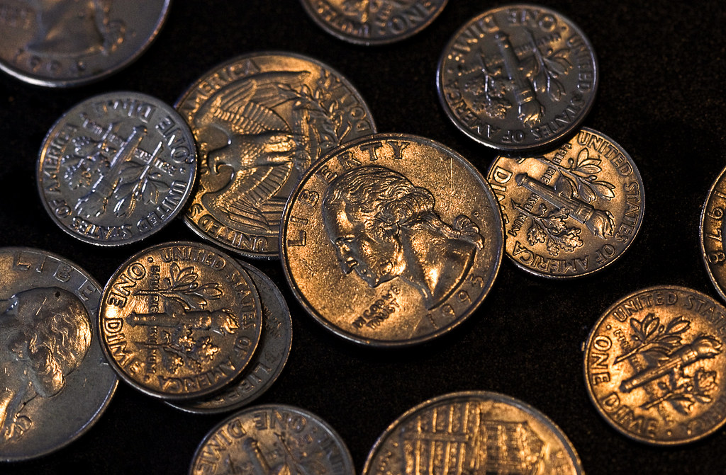 Pile of coins illustrating locally led funding for Kenyan NGOs facing donor cuts