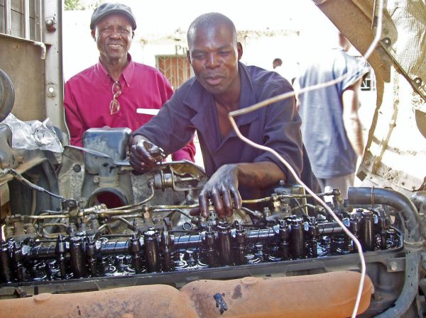 Young trainees in a hands-on skills class, illustrating youth employment programmes like NextGen.Ke