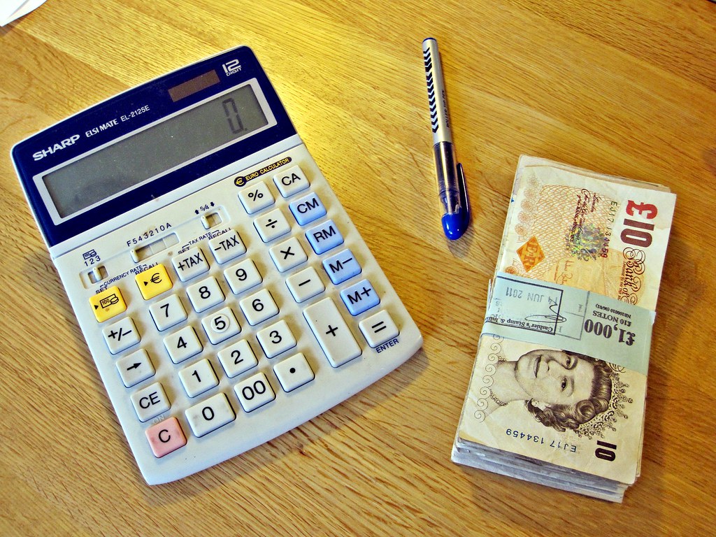 Pocket calculator on a desk, illustrating PBO registration fees and annual compliance costs in Kenya
